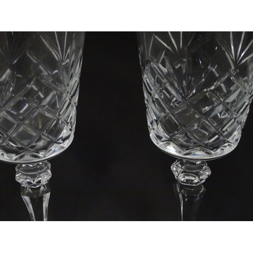218 - A quantity of crystal wine glasses, a decanter etc.