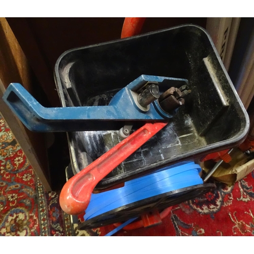 221 - Surveyor's equipment, to include tripods, a trolley, etc.