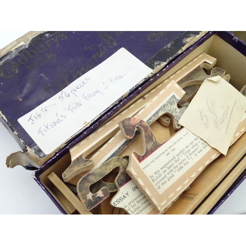 229 - An assortment of early 20thC children's games, puzzles etc.