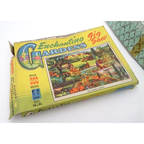 229 - An assortment of early 20thC children's games, puzzles etc.