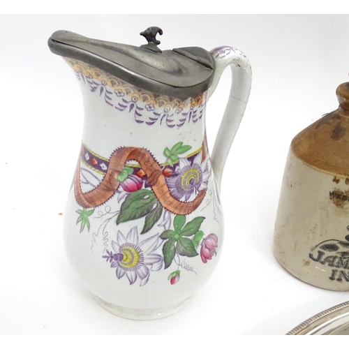 231 - A box of miscellaneous items to include ceramics, metalware, carved wooden items etc.