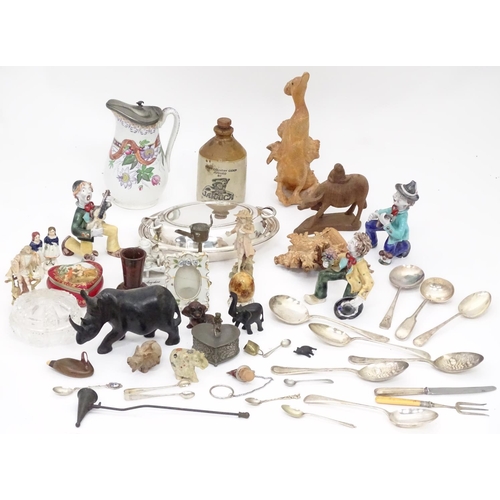 231 - A box of miscellaneous items to include ceramics, metalware, carved wooden items etc.