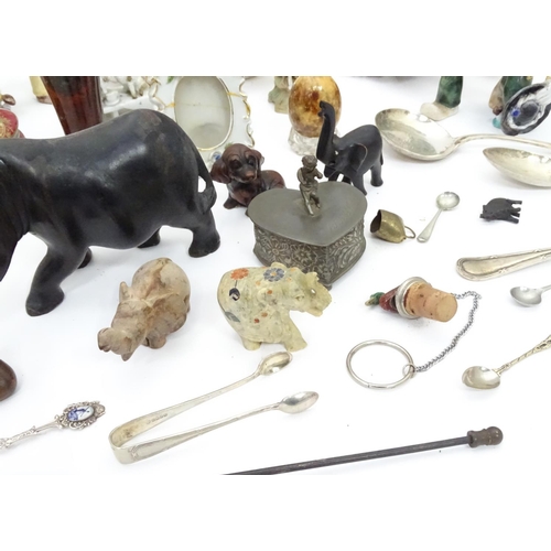 231 - A box of miscellaneous items to include ceramics, metalware, carved wooden items etc.
