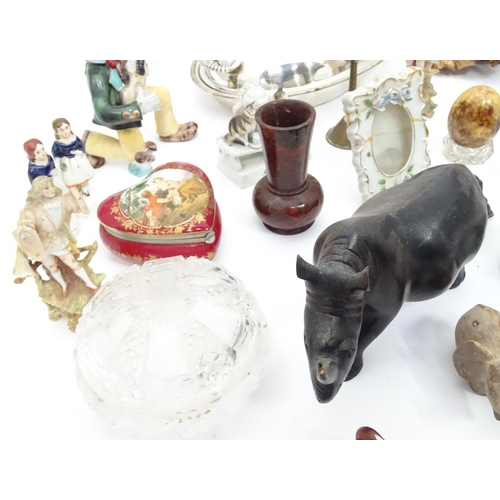 231 - A box of miscellaneous items to include ceramics, metalware, carved wooden items etc.