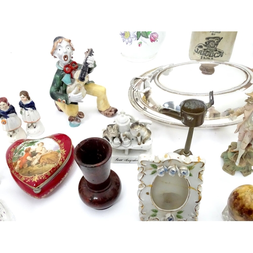 231 - A box of miscellaneous items to include ceramics, metalware, carved wooden items etc.