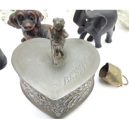 231 - A box of miscellaneous items to include ceramics, metalware, carved wooden items etc.