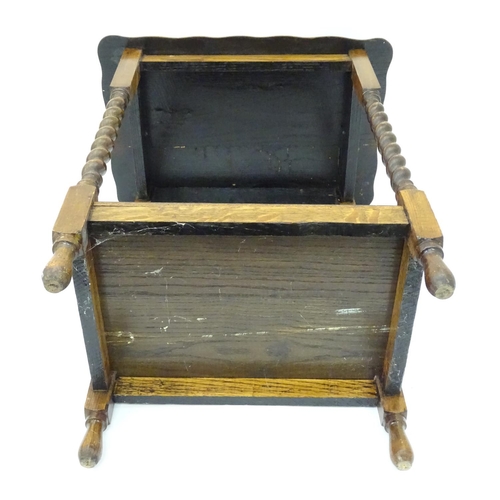 232 - An early 20thC oak side table. Approx. 33 1/2