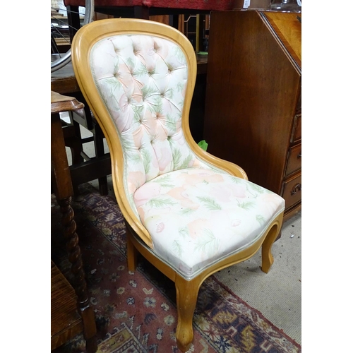 234 - A spoon back chair with button upholstery. Approx. 38 1/2