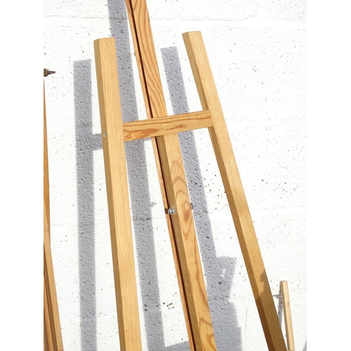 217 - Five late 20thC artist's easels. The largest approx. 20