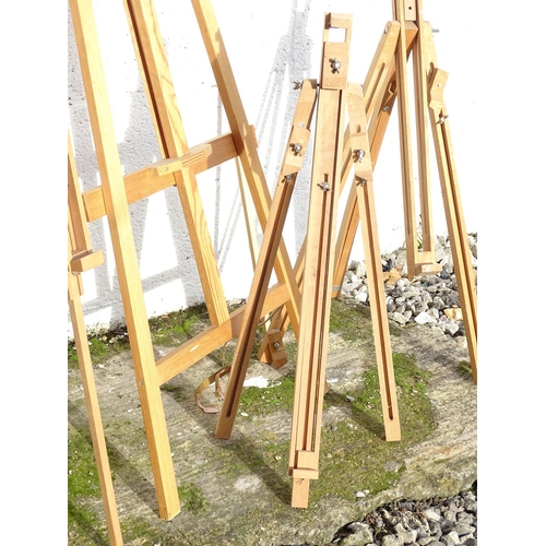 217 - Five late 20thC artist's easels. The largest approx. 20