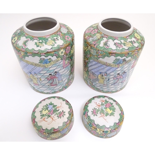 6 - A pair of Chinese jars and covers profusely decorated with flowers and foliage, with two lobed centr... 