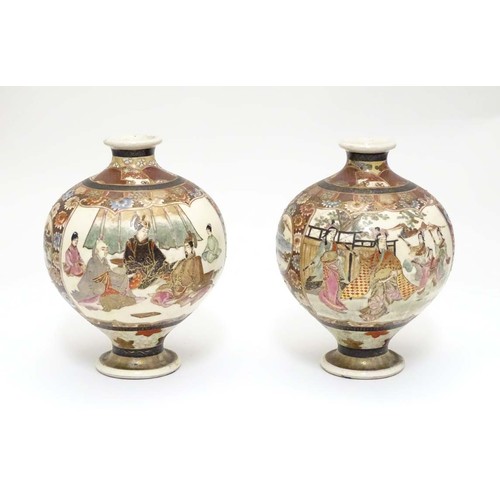 13 - A pair of Japanese Satsuma vases of globular form in the Kutani style with flared rims and feet. The... 