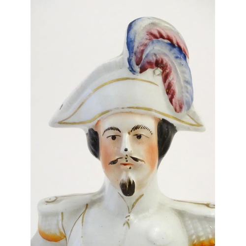 70 - Four large Victorian flatback Staffordshire figures, to include Emperor Napoleon sat upon cannons; A... 