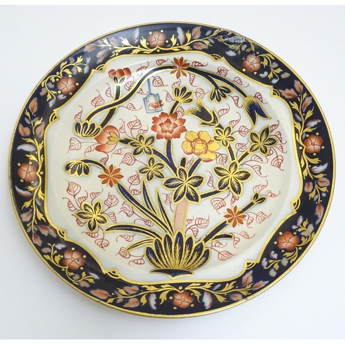 108 - A Copeland plate decorated with flower and foliage with a bird in a cage with cobalt blue and gilt d... 