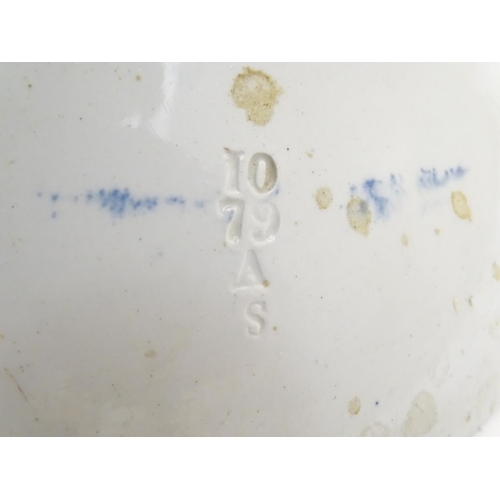 136 - A Victorian water closet bowl / pan with blue and white transfer decoration depicting figures in a c... 