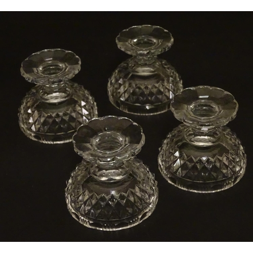 155 - Four Victorian cut glass pedestal table salts, each 2 1/4