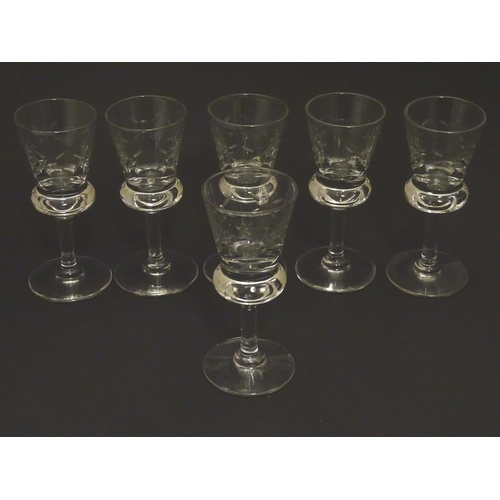 157 - A set of six crystal sherry glasses formed as thistles, with cut roundel  decoration, each 4 1/8