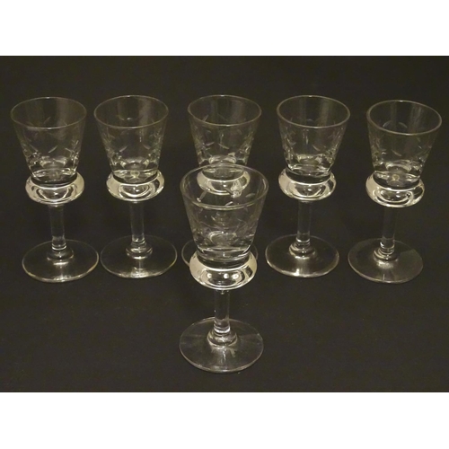 157 - A set of six crystal sherry glasses formed as thistles, with cut roundel  decoration, each 4 1/8