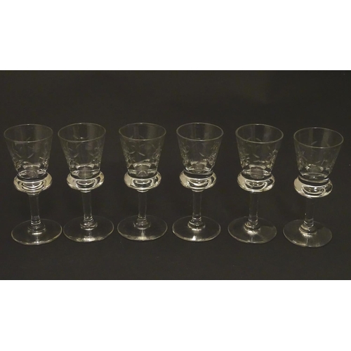 157 - A set of six crystal sherry glasses formed as thistles, with cut roundel  decoration, each 4 1/8