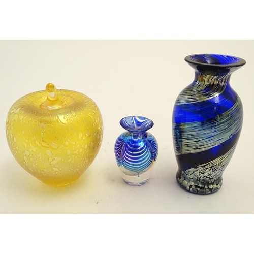 167 - Three items of art glass, comprising a paperweight formed as an apple, and two vases. The largest 5 ... 