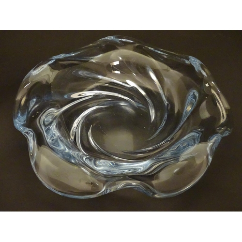 183 - An c1940 Orrefors Edvin Ohrstrom centerpiece glass crystal bowl, formed as a swirl, signed under 'FU... 