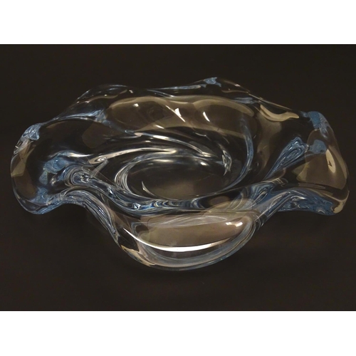 183 - An c1940 Orrefors Edvin Ohrstrom centerpiece glass crystal bowl, formed as a swirl, signed under 'FU... 