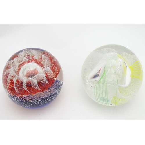 185 - Five art glass paperweights, including an example by Caithness, Scotland formed as a snow capped mou... 