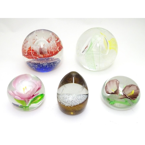 185 - Five art glass paperweights, including an example by Caithness, Scotland formed as a snow capped mou... 