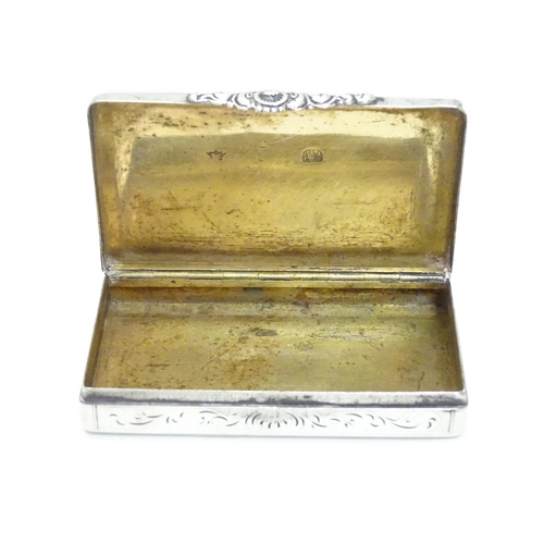 195 - A Continental silver snuff box with engraved decoration and glided interior marked with Austrian / H... 