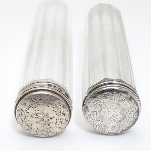 207 - Two Victorian silver lidded glass vanity bottles. Hallmarked Birmingham 1897 maker William Amaziah E... 