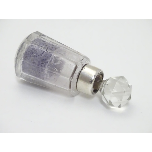 212 - A cut glass scent bottle with silver collar hallmarked Birmingham 1932 maker W J Myatt & Co 3 1/4