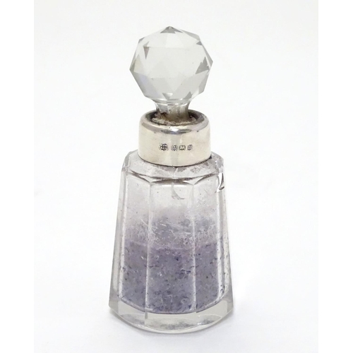 212 - A cut glass scent bottle with silver collar hallmarked Birmingham 1932 maker W J Myatt & Co 3 1/4