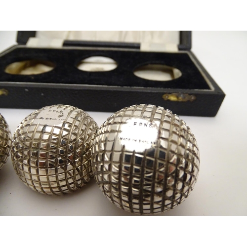 301 - A novelty 3 piece silver plat cruet set comprising salt, pepper and mustard pots formed as gold ball... 