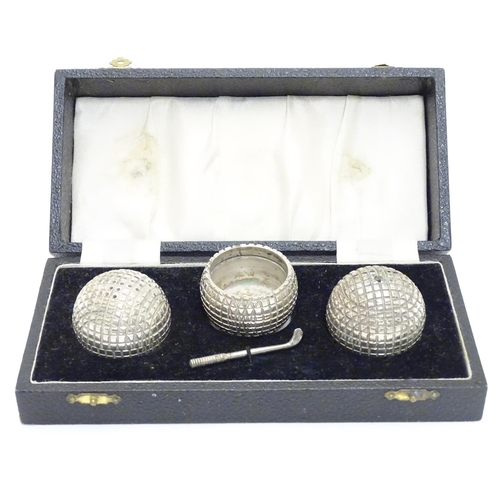 301 - A novelty 3 piece silver plat cruet set comprising salt, pepper and mustard pots formed as gold ball... 