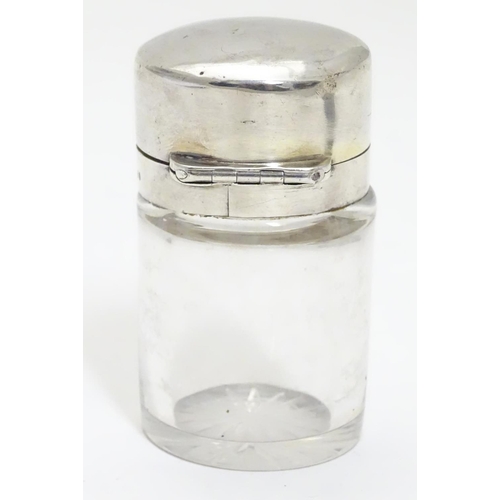 327 - A Victorian glass scent/salts bottle with stopper and silver hinged lid.  Hallmarked London 1886 mak... 