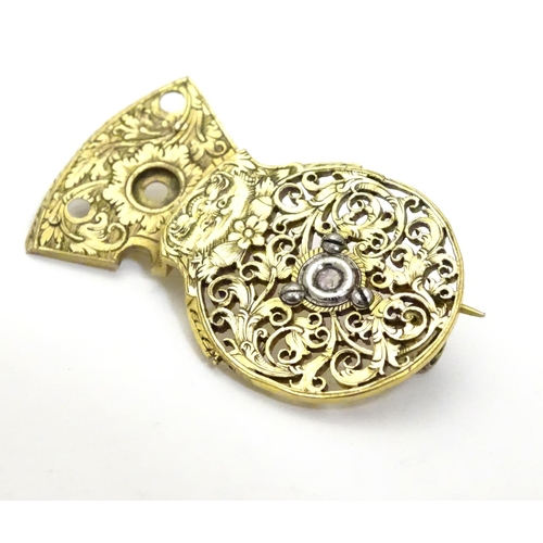 467 - A gilt metal brooch formed from a verge pocket watch balance cock, set with diamond to centre. Appro... 