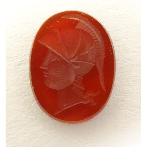 523 - A carnelian intaglio seal unmounted depicting head of a Greco Roman warrior. Approx. 1/2