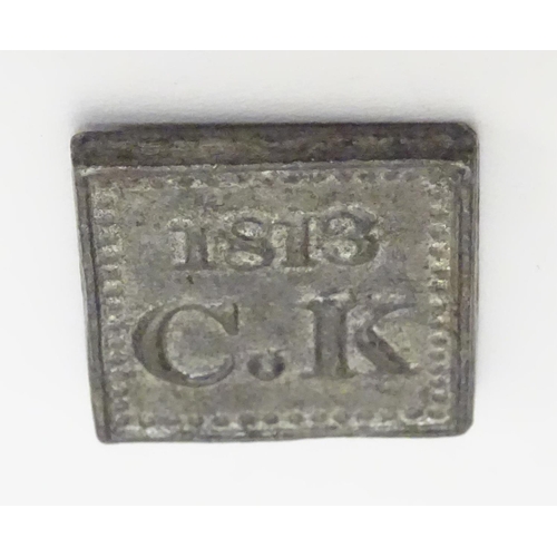 539 - A 19thC communion token, marked 'CK 1813', with Stag's head on the reverse. Moulded lead, approximat... 