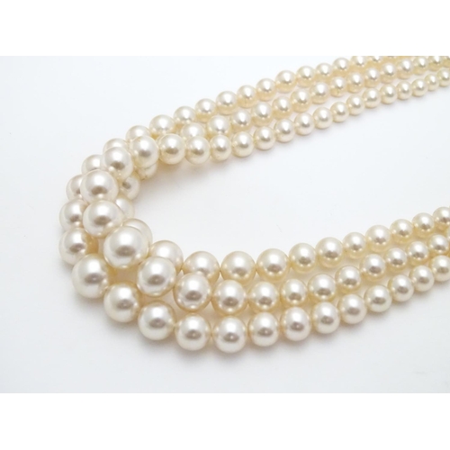 542 - Vintage faux pearl three strand necklace by Rosita. Approx 15