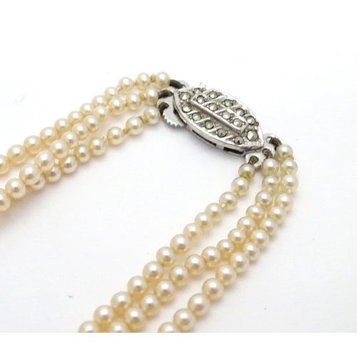 542 - Vintage faux pearl three strand necklace by Rosita. Approx 15