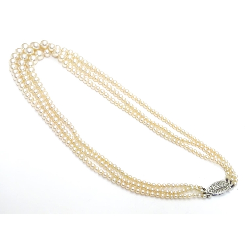 542 - Vintage faux pearl three strand necklace by Rosita. Approx 15