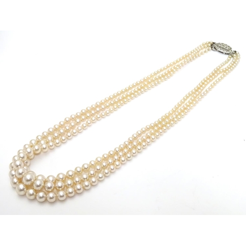 542 - Vintage faux pearl three strand necklace by Rosita. Approx 15