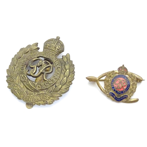 572 - Militaria : a mid-20thC brass Royal Engineers cap badge and lapel badge, the largest 1 5/8