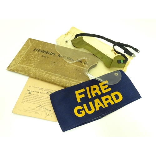 578 - Militaria : a trio of WWII / Second World War / WW2 Civil Defence Service items, comprising a fabric... 