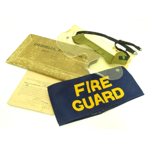 578 - Militaria : a trio of WWII / Second World War / WW2 Civil Defence Service items, comprising a fabric... 