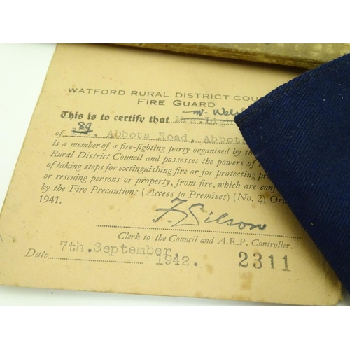 578 - Militaria : a trio of WWII / Second World War / WW2 Civil Defence Service items, comprising a fabric... 