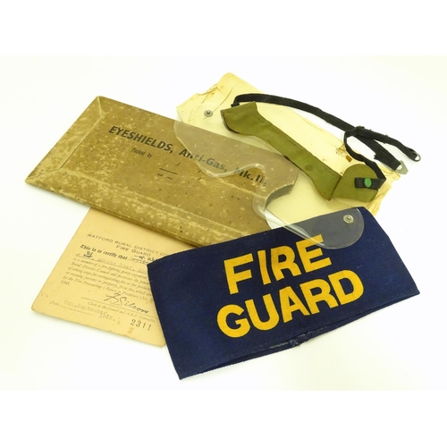 578 - Militaria : a trio of WWII / Second World War / WW2 Civil Defence Service items, comprising a fabric... 