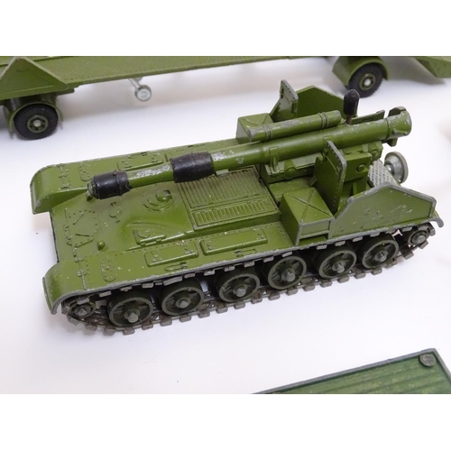 700 - Toys: A quantity of Dinky Toys die cast scale model military vehicles comprising AEC Articulated Lor... 