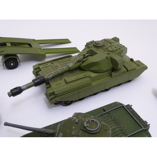 700 - Toys: A quantity of Dinky Toys die cast scale model military vehicles comprising AEC Articulated Lor... 