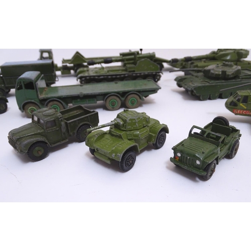 700 - Toys: A quantity of Dinky Toys die cast scale model military vehicles comprising AEC Articulated Lor... 